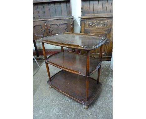 An Ercol Golden Dawn elm and beech Windsor trolley 