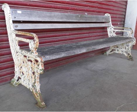 A Victorian cast iron framed bench 