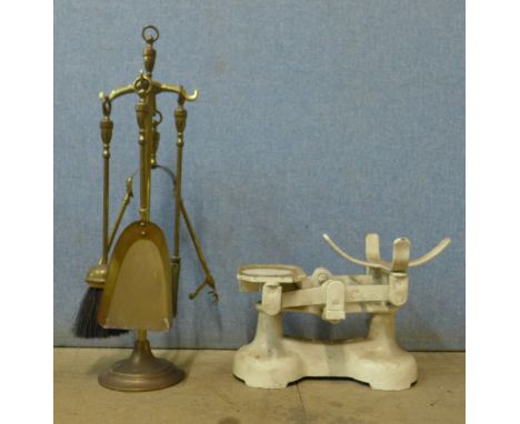 A set of metal scales and a companion set 
