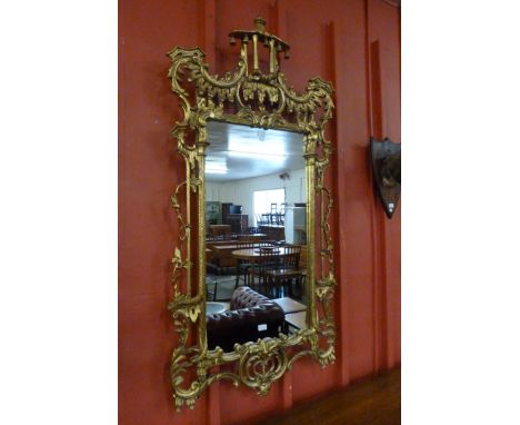 A Chinese Chippendale style pagoda topped gilt framed mirror 