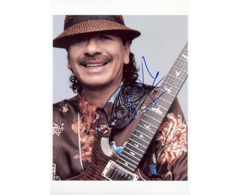 SANTANA CARLOS: (1947- ) Mexican-American Guitarist. Signed colour 8 x 12 photograph by Santana, the image showing the guitar