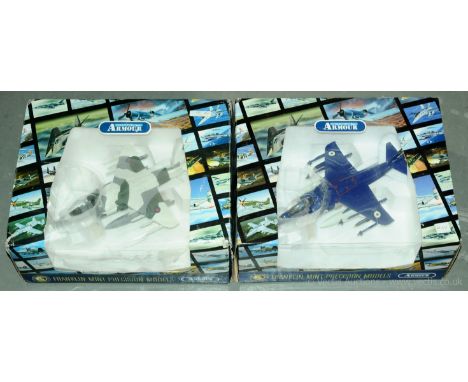 Franklin Mint Armour Collection - a boxed pair of 1/48 Scale Military Aircraft comprising of B11E764 an AV8 Harrier Jump Jet 