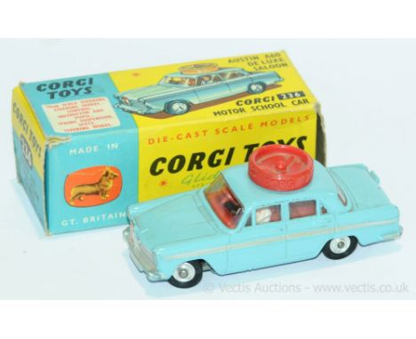 Corgi a boxed 236 Austin A60 De Luxe Saloon (Corgi Motor School Car). Model is right hand drive. Conditions generally appear 