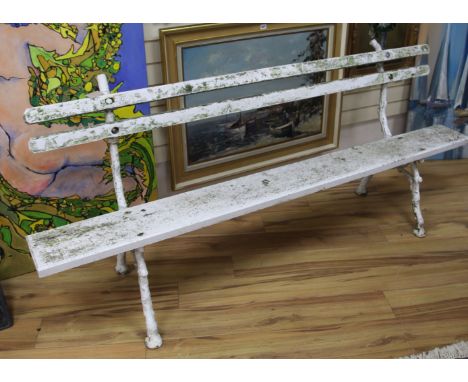 A garden bench with cast iron ends W.210cm