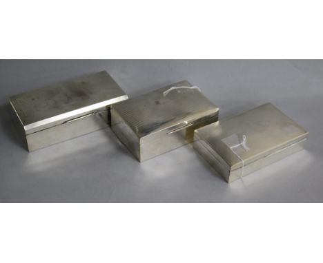 Three engine-turned silver cigarette boxes