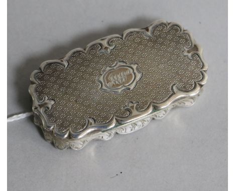  A Victorian engine turned silver vinaigrette (lacking grille), by Hilliard &amp; Thomason, Birmingham, 1850, 55mm.