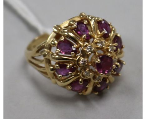 A 14ct gold, ruby & diamond cluster dress ring, size L.