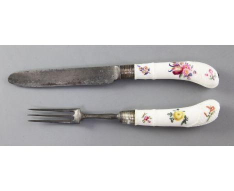A Meissen porcelain handled knife and fork, c.1750, painted with floral sprays, ozier moulded borders, unmarked, steel blade 