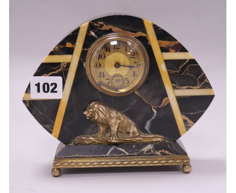 A black and amber art deco marble clock with bronze lion mount 15.5 x 19cm