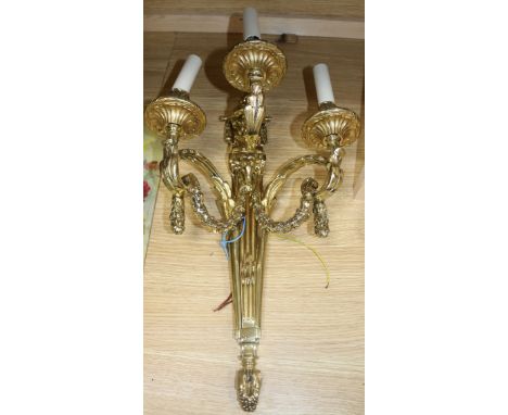 An ormolu three branch wall light height 55cm