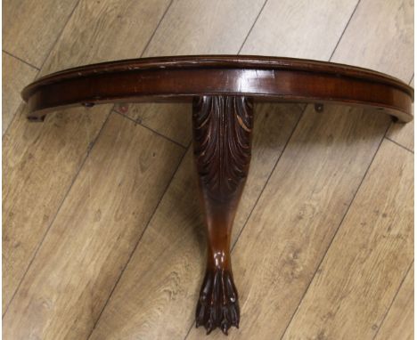 A 'D' shaped carved mahogany console table W.89cm