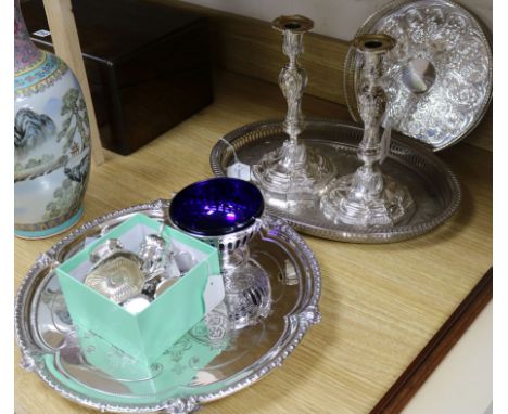 A pair of French Louis XIV style silver-plated and ormolu candlesticks and various plated items, including three trays, condi