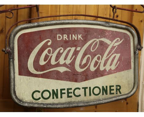 A Coca Cola sign with bracket W.77cm