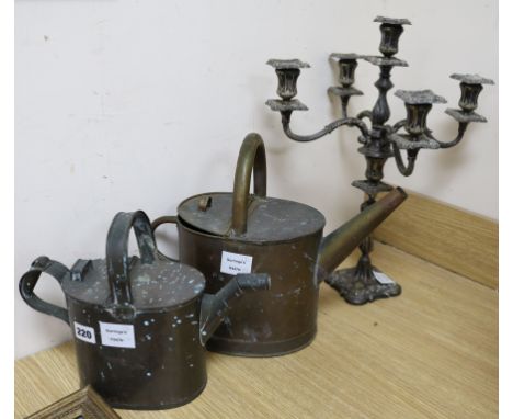A Victorian plated five light candelabrum and two Victorian copper water cans (3)