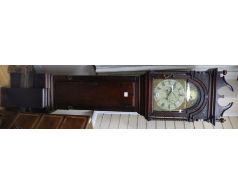 A late 18th century oak and mahogany eight day longcase clock, with painted arched and gilt brass dial
