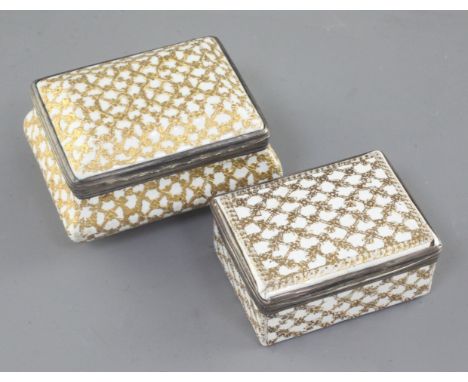 Two late 18th / early 19th century French white enamel snuff boxes, with diapered tooled gilt decoration and white metal hing
