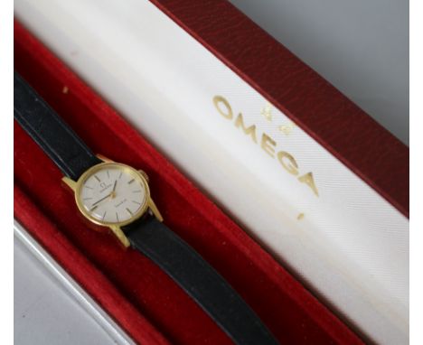 A lady's 18ct gold Omega manual wind wrist watch, with Omega box