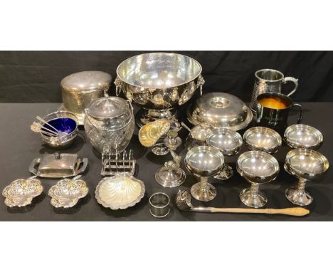 A large silver plated punch bowl; silver on copper toddy ladle; EPNS biscuit barrel with integral stand; an EPNS apple sauce/