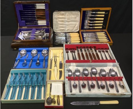 An oak canteen; various silver plated and stainless steel flatware, carving set, fish knives and forks; qty 