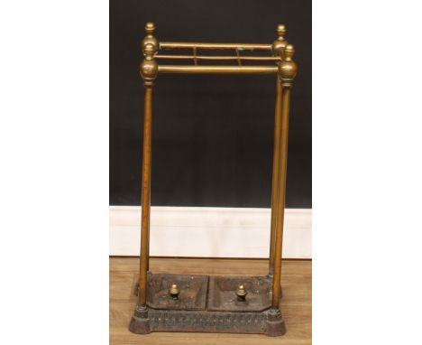 A Victorian brass and iron walking stick or umbrella stand, 62.5cm high, 32cm wide, 22.5cm deep 