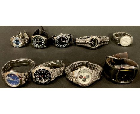 A Casio 200m divers watch; a Ben Sherman day/date watch; others, Diesel, Swatch, Timex, Gianni Sabatini, Constant (boxed) (9)