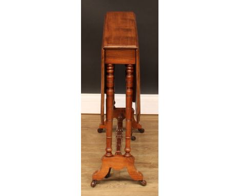 A late Victorian Sutherland table, chamfered rectangular top with fall leaves, turned supports and stretcher, sledge base, ce