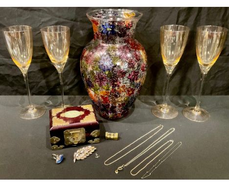 A set of four champagne glasses; a large colourful baluster glass vase, painted with flowers; a Chinese jewellery box, the co