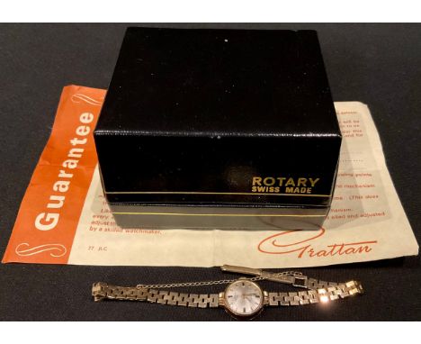 A lady's 9ct gold Rotary wristwatch, champagne dial, baton indicators, integral 9ct gold bracelet strap, safety chain, marked