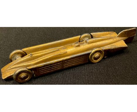 A die-cast model Golden Arrow, Copyright Under Licence From Sir Henry Segrave, Holder World's Speed Record 231mph At Daytona 