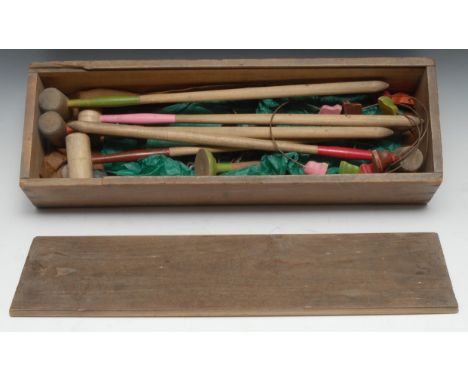 An early 20th century table croquet set, the pine box with sliding cover, 50cm wide 