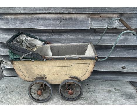 A vintage Toy pram and a collection of vintage Scalextric cars&nbsp;
