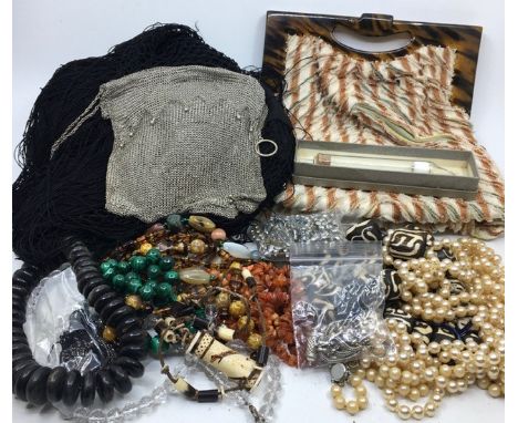 A collection of costume jewellery together with a silver purse, a vintage bag and a vintage shawl.&nbsp;