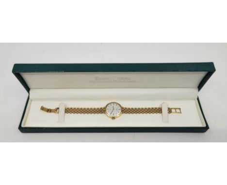 A 9ct. gold Rotary ladies' quartz wrist watch, c.1979, having signed silvered circular dial with baton indices, 21mm wide 9ct