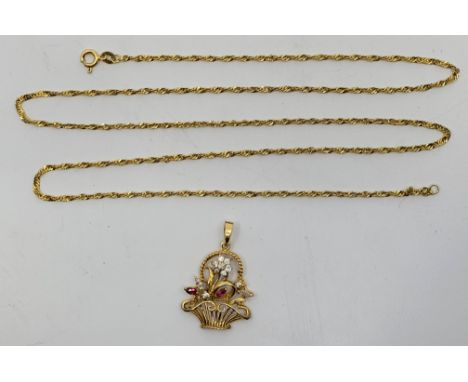 A precious yellow metal, diamond and ruby floral basket pendant, the open work pendant fashioned as a basket of flowers set m