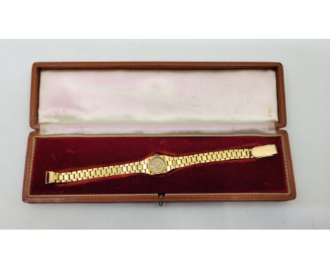 An 18ct. yellow gold ladies' bracelet watch, c.1955, manual movement, having white enamel circular dial with gold baton and d