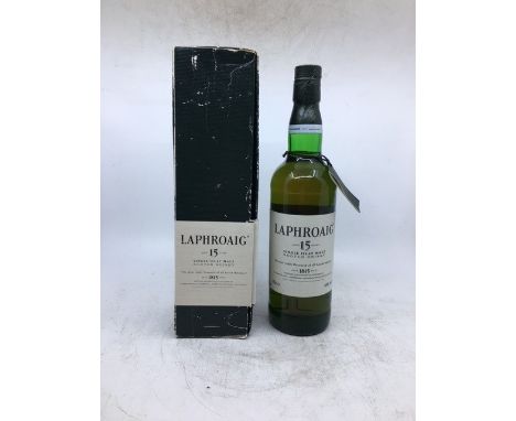 Whisky. Laphroaig 15-year old single Islay malt, pre Royal warrant 1990's.  Condition: Seal intact and level top of shoulder.