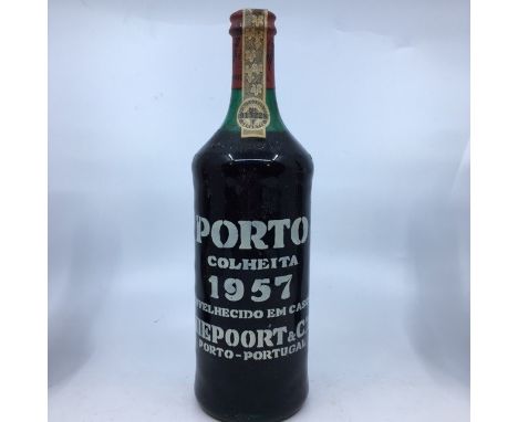 1 bottle of extremely rare 1957 Colheita Niepoort port. Level top of shoulder, seal in good condition. 1 bottle of 1961 Warre