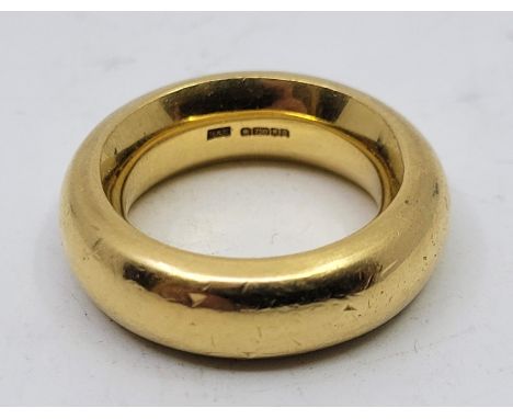 An 18ct. yellow gold heavy wedding band, by Jamieson &amp; Carry, Edinburgh 2006, size UK K 1/2. (22.8g)