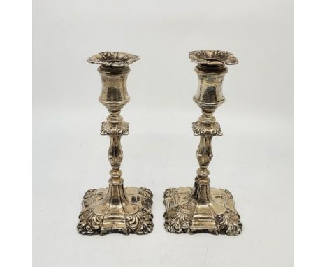 A pair of Victorian silver candlesticks, by Henry Wilkinson &amp; Co, London 1893, with weighted bases, height 17.6cm (gross 