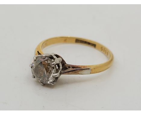 An 18ct. gold and platinum single stone diamond ring, claw set old-cut diamond (EDW 1.00 carats, clarity estimated L2), size 