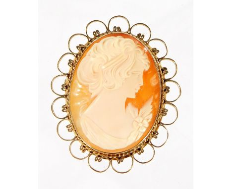 A shell cameo brooch, in 9ct gold ornate frame, the shell cameo depicting a maiden, in head and shoulder portrait, 3cm x 4cm,