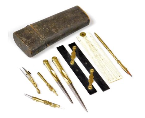 A set of 19thC drawing instruments, to include an ivory folding ruler stamped E.Halse &amp; Sons, compass etc., in a black sh