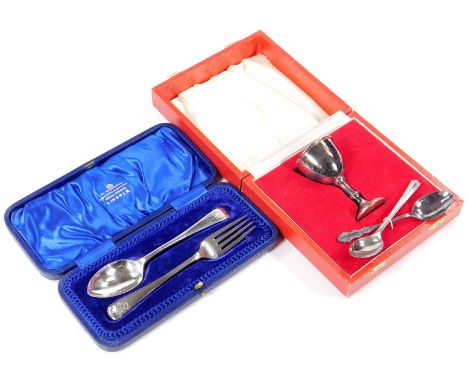 A George V silver cased cutlery set, comprising fork and spoon, 15cm W, old English pattern, initialled, Sheffield 1934,  and