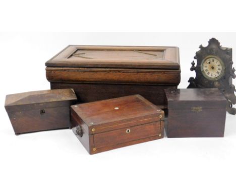 An early 20thC oak box, of rectangular form, with beaded lid and moulded body, on castors, 26cm H, 56cm W, 35cm D, a mahogany