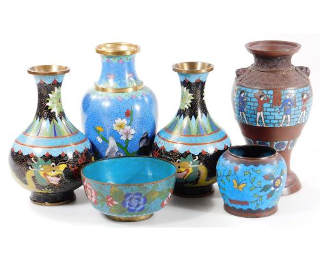 Various cloisonne, to include a pair of Chinese vases, decorated with five clawed dragons on a black ground, polychrome decor