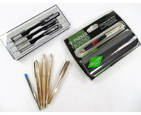 Various fountain pens, Parker gilt coloured examples, partially engine turned with gilt coloured clip, 13cm W, others similar
