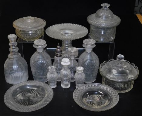 A pair of small Regency cut glass spirit decanters, with step cut necks and mushroom stoppers, small decanter bottles and thr