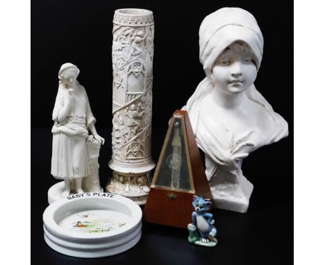 An early 20thC plaster vase, of cylindrical form, raised with various figures and trees, 41cm H, a plaster bust of girl quart