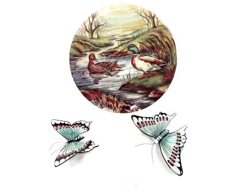 A Lalique style clear glass perfume bottle with elaborate dove top, two graduated enamel butterfly wall ornaments, 12cm H, et