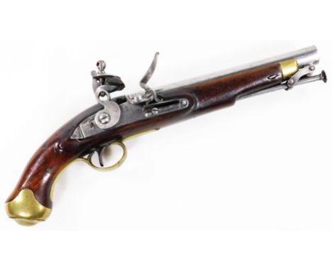 A George III Tower flint lock pistol, with GR and crown marks, brass mounts and walnut body, metal ram rod, 40cm W. (with a f